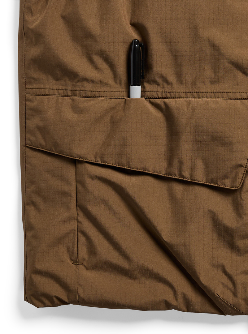 Artikelbild 5 des Artikels “REVERSIBLE INSULATED Weste 2027 earth ship brown M“